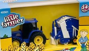 BRI40561 - Tracteur Bleu avec presse ronde Ech:1/32 - 1