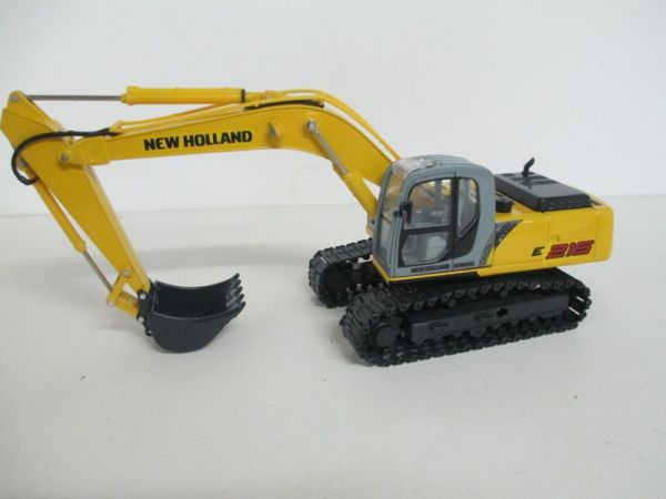 OCROS00175 - Pelle NEW HOLLAND E215 avec Chenilles Métal - 1