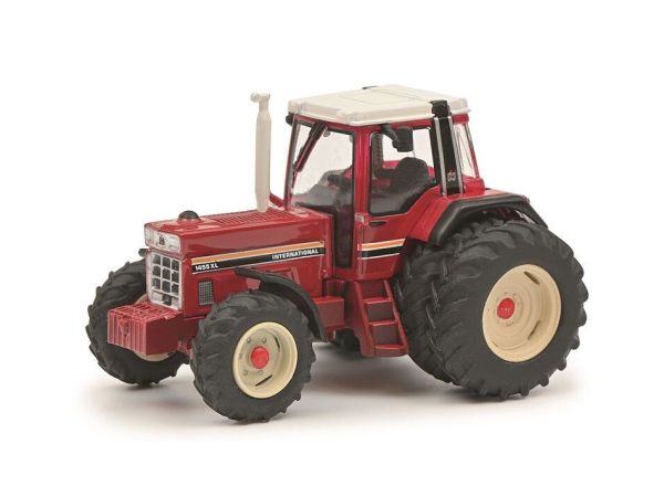 Tracteur miniature en métal rouge, L 27 cm