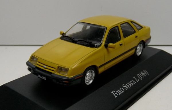 MAGARGAQV28 - FORD Sierra I 1984 Jaune avec fascicule - 1