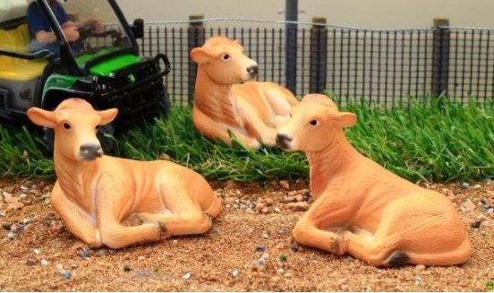 BT3070 - 3 vaches marron clair couchées - 1