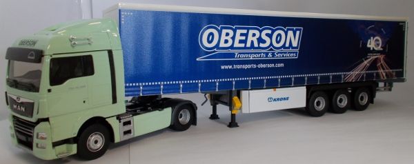 ELI116262 - MAN TGX Euro 6 C 4x2 avec semi bâchée 3 essieux KRONE transport Oberson - 1