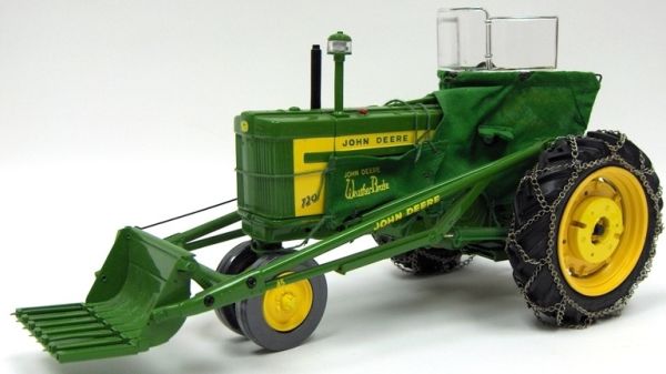 ERT15165 - JOHN DEERE 720w/80 ROW CROP avec fouches et lame chainage sur les pneus - 1
