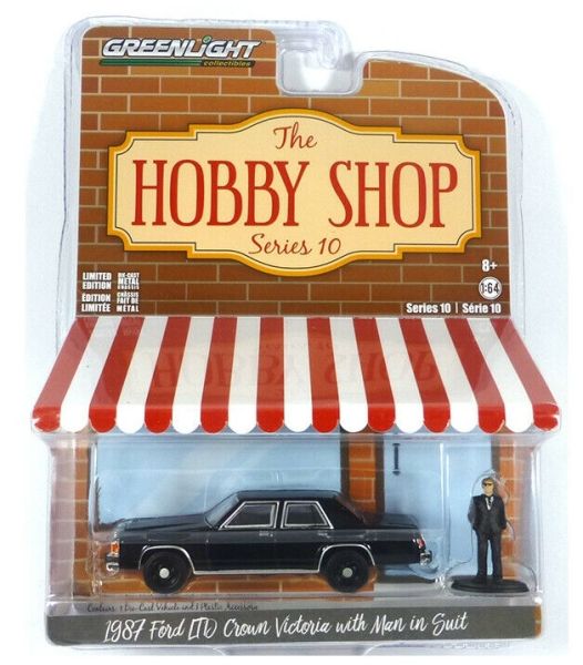 GREEN97100-E - FORD LTD Crown Victoria 1987 noire avec figurine Série The Hobby Shop vendue sous blister - 1