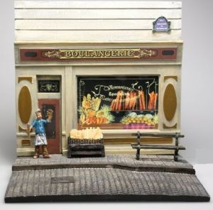 Diorama façade de boulangerie avec trottoir et figurine dimension H14 cm x L 15 cm  x P14 cm