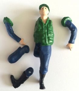Personnage qui monte des marches Vert foncé
