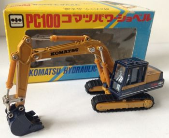 OCSHI613 - Occasion - Pelle KOMATSU PC100 "Neuf en boîte" - "Boîte abîmée"