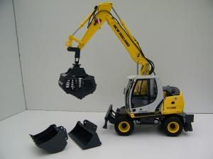 PFT03 - Pelle sur pneus NEW HOLLAND WE170 avec ses 3 accessoires