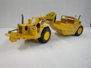 NZG127 - Scraper CATERPILLAR 627 PUSH PULL 1ere Série