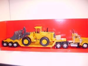 NEW11295 - KENWORTH W900 6x4  porte engins 3 Essieux avec chargeur VOLVO L220E Ech:1/32