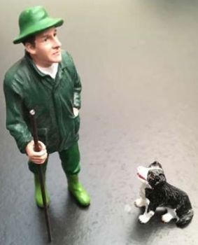 ADF32116 - Personnage et son chien border collie