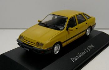 MAGARGAQV28 - FORD Sierra I 1984 Jaune avec fascicule