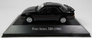 MAGARG47 - FORD Sierra XR4 1984 noire 3 portes vendue sous blister