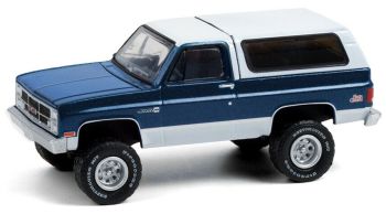 GREEN35190-C - GMC Jimmy 4x4 1987 bleu et blanc All-Terrain vendue sous blister